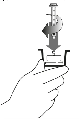 A hand holding a device with a thermometer
Description automatically generated
