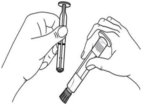 A close-up of a hand holding a syringe

Description automatically generated