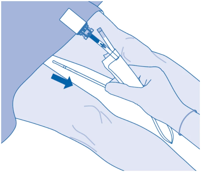 A close-up of a hand holding a tube

Description automatically generated